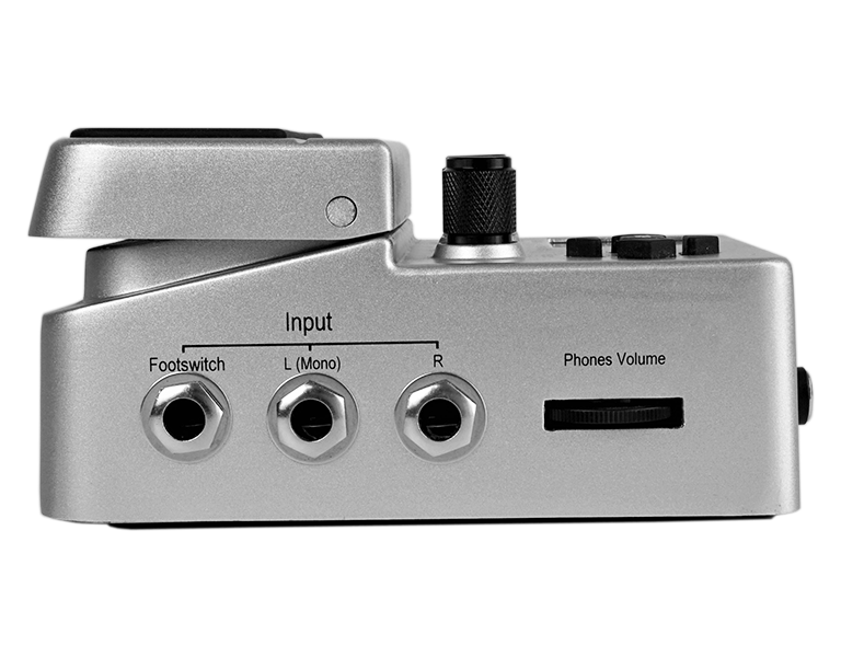 Side view of the BeatBuddy drum machine showing its inputs and headphone volume wheel.