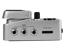 Load image into Gallery viewer, Side view of the BeatBuddy drum machine showing its inputs and headphone volume wheel.
